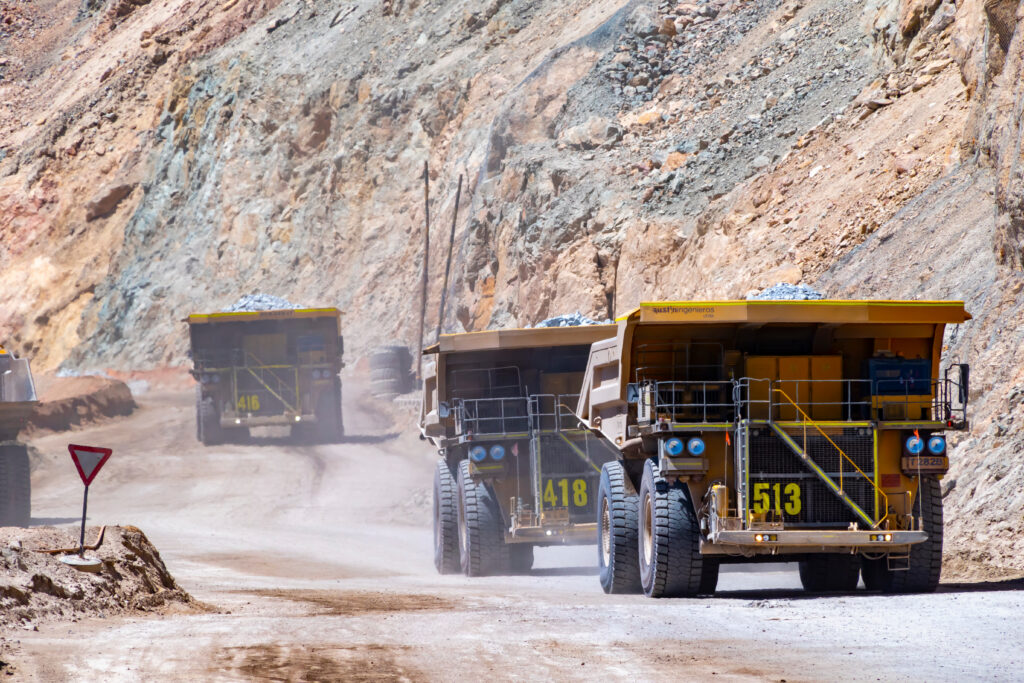 Big haul truck and machinery working in Chuquicamata, biggest open pit copper mine of the world, Calama, Chile.